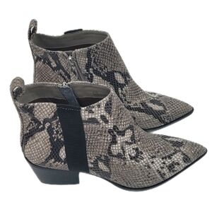 Linea Paolo Sevilla pointed-toe bootie in python snake print leather.